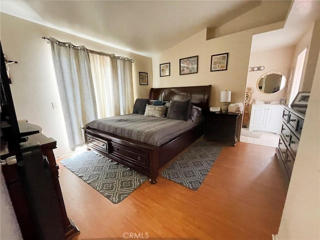 1186 Runaway Cir, Colton, CA 92324 - bedroom with vaulted ceiling and wood finished floors