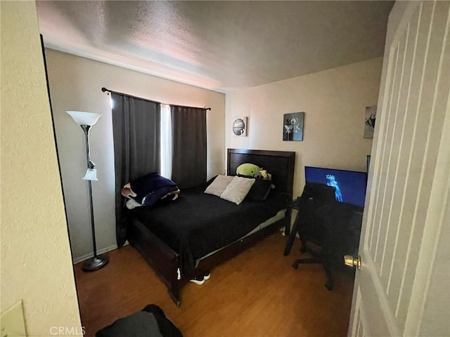 1186 Runaway Cir, Colton, CA 92324 - bedroom featuring wood finished floors