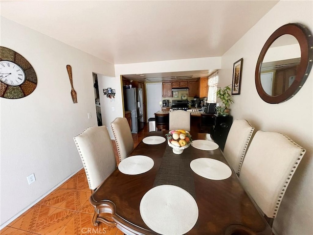 1186 Runaway Cir, Colton, CA 92324 - dining room featuring light tile patterned flooring