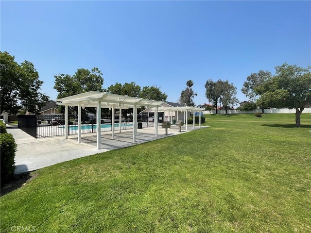 1186 Runaway Cir, Colton, CA 92324 - view of home's community with a pergola, a patio, and a swimming pool