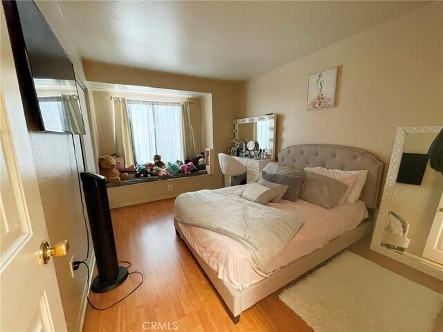 1186 Runaway Cir, Colton, CA 92324 - bedroom featuring light wood-style flooring
