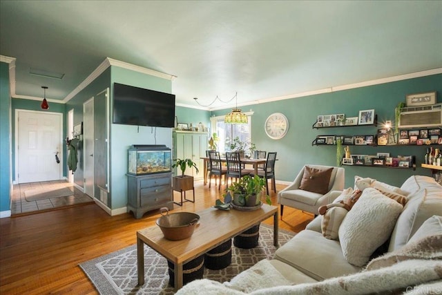 646 Downer Ave, El Cajon, CA 92020 - living area featuring crown molding and wood finished floors