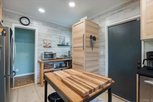 646 Downer Ave, El Cajon, CA 92020 - kitchen with freestanding refrigerator, ornamental molding, recessed lighting, and dark countertops
