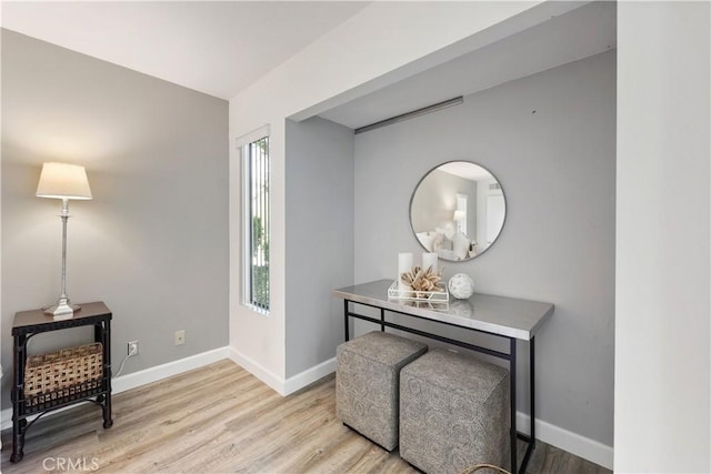 190 N Singingwood St Unit 1, Orange, CA 92869 - foyer entrance featuring baseboards and light wood finished floors