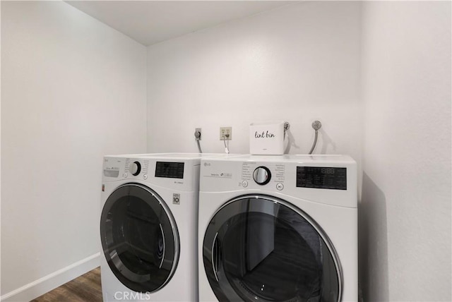 190 N Singingwood St Unit 1, Orange, CA 92869 - laundry room featuring washer and clothes dryer and dark wood-style flooring