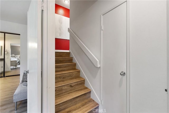 190 N Singingwood St Unit 1, Orange, CA 92869 - stairs featuring wood finished floors