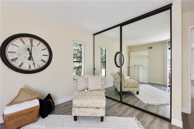 190 N Singingwood St Unit 1, Orange, CA 92869 - living area with wood finished floors and baseboards