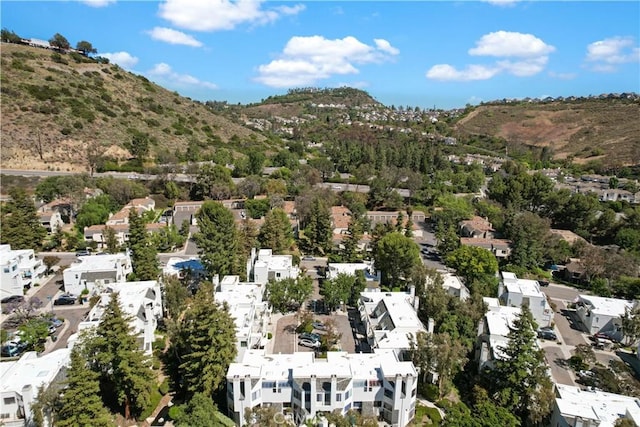 190 N Singingwood St Unit 1, Orange, CA 92869 - aerial view of property's location featuring a mountain backdrop and nearby suburban area
