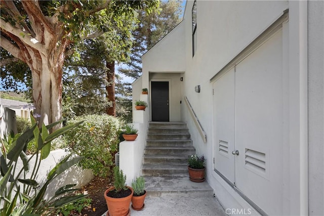 190 N Singingwood St Unit 1, Orange, CA 92869 - view of exterior entry with stucco siding