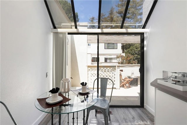 190 N Singingwood St Unit 1, Orange, CA 92869 - dining area with wood finished floors and baseboards