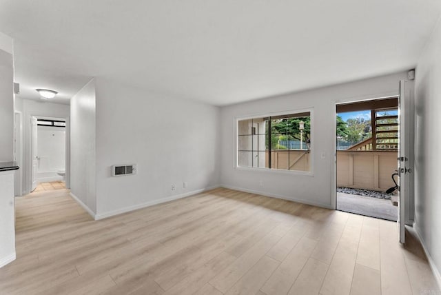 12590 Carmel Creek Rd Unit 1, San Diego, CA 92130 - empty room featuring light wood-style flooring and baseboards