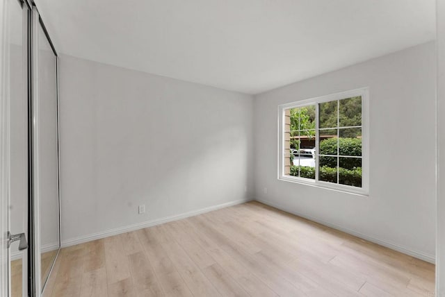 12590 Carmel Creek Rd Unit 1, San Diego, CA 92130 - empty room featuring light wood-type flooring and baseboards