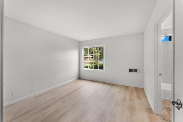 12590 Carmel Creek Rd Unit 1, San Diego, CA 92130 - spare room featuring light wood-type flooring and baseboards