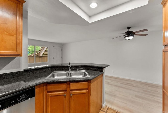 12590 Carmel Creek Rd Unit 1, San Diego, CA 92130 - kitchen featuring dishwasher, a sink, a peninsula, light wood-type flooring, and brown cabinets