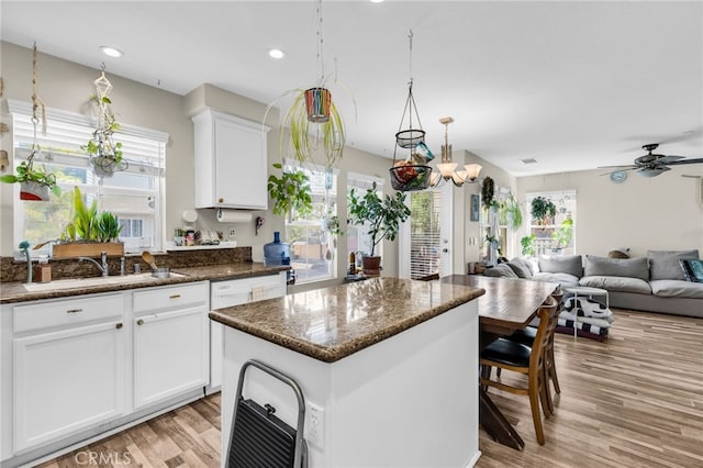 5 Quartz Ln, Ladera Ranch, CA 92694 - kitchen featuring plenty of natural light, light wood-style floors, a kitchen island, and recessed lighting