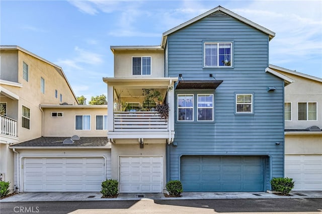 5 Quartz Ln, Ladera Ranch, CA 92694 - back of house featuring a garage and a balcony