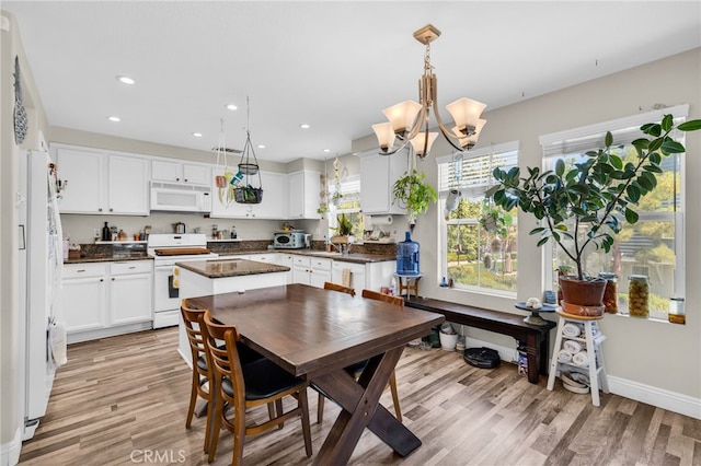 5 Quartz Ln, Ladera Ranch, CA 92694 - dining area with light wood-style floors, a chandelier, and recessed lighting
