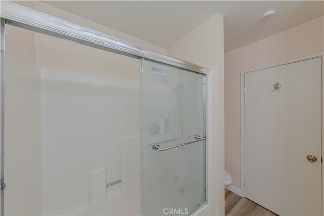 22224 S Vermont Ave Unit 102C, Torrance, CA 90502 - full bathroom with toilet and wood finished floors