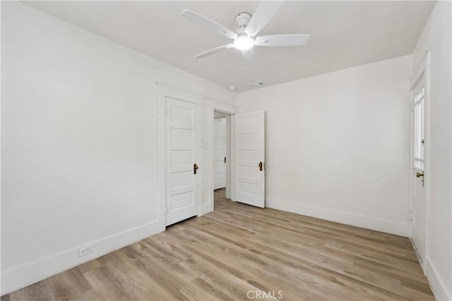 4415 12th St, Riverside, CA 92501 - spare room featuring light wood-type flooring, baseboards, and a ceiling fan