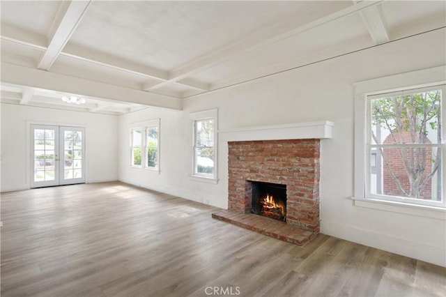 4415 12th St, Riverside, CA 92501 - unfurnished living room featuring wood finished floors, coffered ceiling, a brick fireplace, beam ceiling, and baseboards