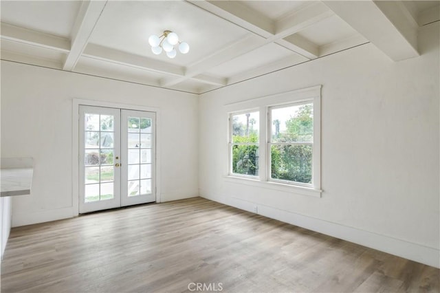 4415 12th St, Riverside, CA 92501 - spare room with coffered ceiling, french doors, wood finished floors, beamed ceiling, and baseboards