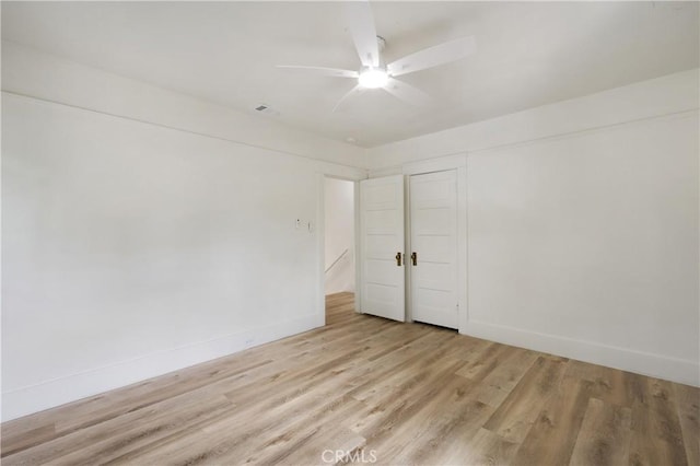 4415 12th St, Riverside, CA 92501 - spare room with ceiling fan, light wood-type flooring, and baseboards