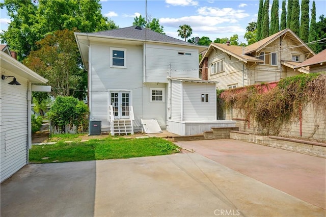 4415 12th St, Riverside, CA 92501 - rear view of property with a patio, entry steps, and central AC unit