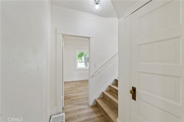 4415 12th St, Riverside, CA 92501 - stairs with wood finished floors and baseboards