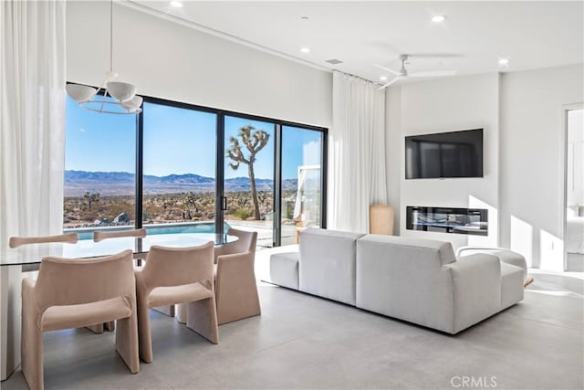 59425 Sun Mesa Rd, Yucca Valley, CA 92284 - living room featuring finished concrete flooring, recessed lighting, a towering ceiling, and ceiling fan