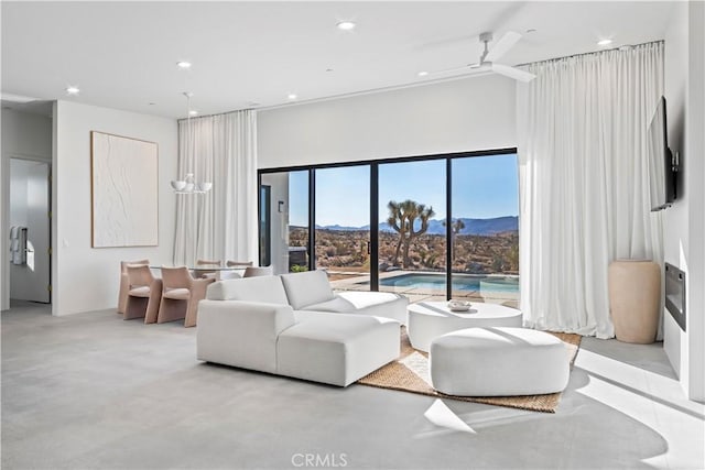 59425 Sun Mesa Rd, Yucca Valley, CA 92284 - living room featuring recessed lighting, a high ceiling, and finished concrete flooring