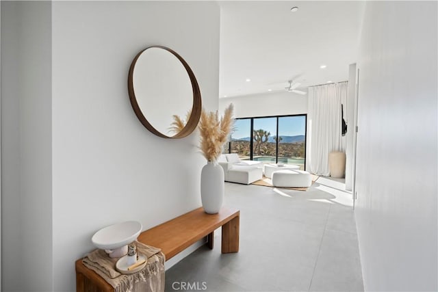 59425 Sun Mesa Rd, Yucca Valley, CA 92284 - hall featuring recessed lighting, concrete flooring, and a mountain view