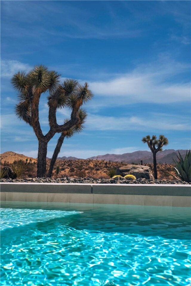 59425 Sun Mesa Rd, Yucca Valley, CA 92284 - view of swimming pool featuring a mountain view