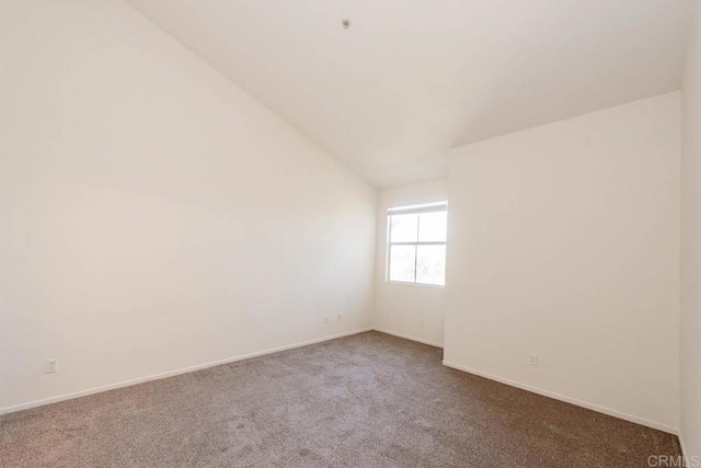 1875 Baudouin Pl Unit 1731, Chula Vista, CA 91913 - carpeted empty room featuring lofted ceiling and baseboards