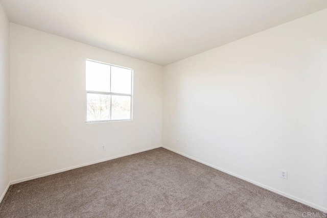 1875 Baudouin Pl Unit 1731, Chula Vista, CA 91913 - carpeted empty room with baseboards