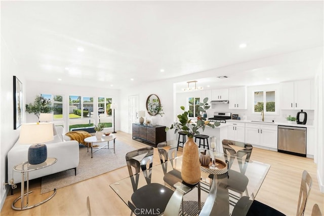 430 N Ellen Dr, West Covina, CA 91790 - dining space with plenty of natural light, light wood-style flooring, and recessed lighting
