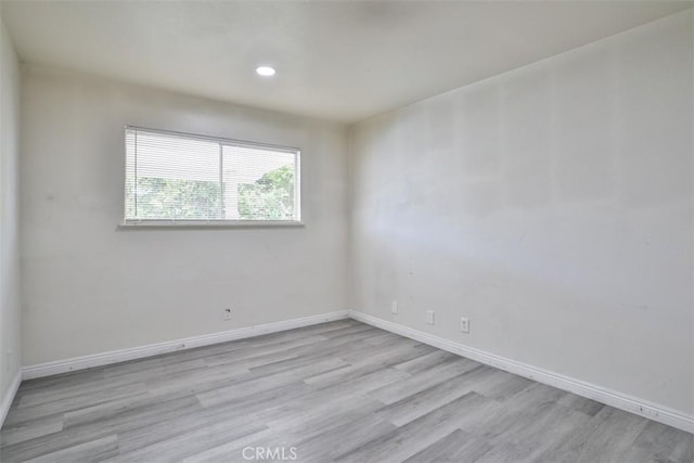 11112 Camellia Ave, Fountain Valley, CA 92708 - unfurnished room featuring light wood-style floors, baseboards, and recessed lighting