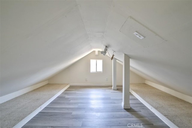 11112 Camellia Ave, Fountain Valley, CA 92708 - additional living space featuring lofted ceiling, wood finished floors, and baseboards