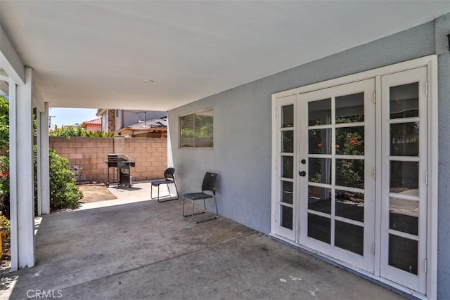 11112 Camellia Ave, Fountain Valley, CA 92708 - view of patio featuring grilling area and french doors