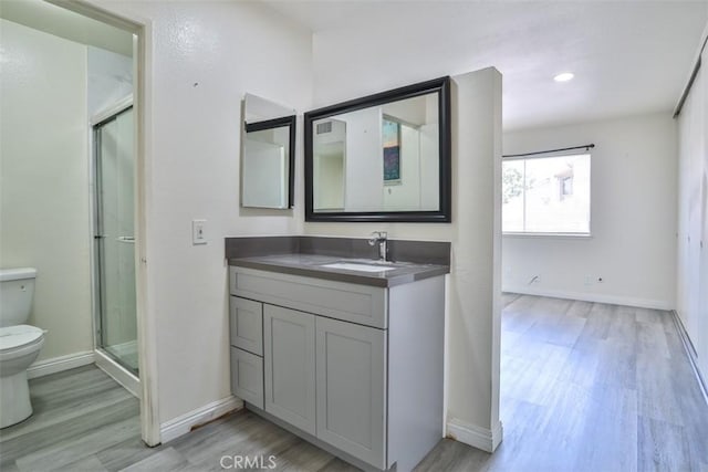 11112 Camellia Ave, Fountain Valley, CA 92708 - full bath with toilet, wood finished floors, and vanity