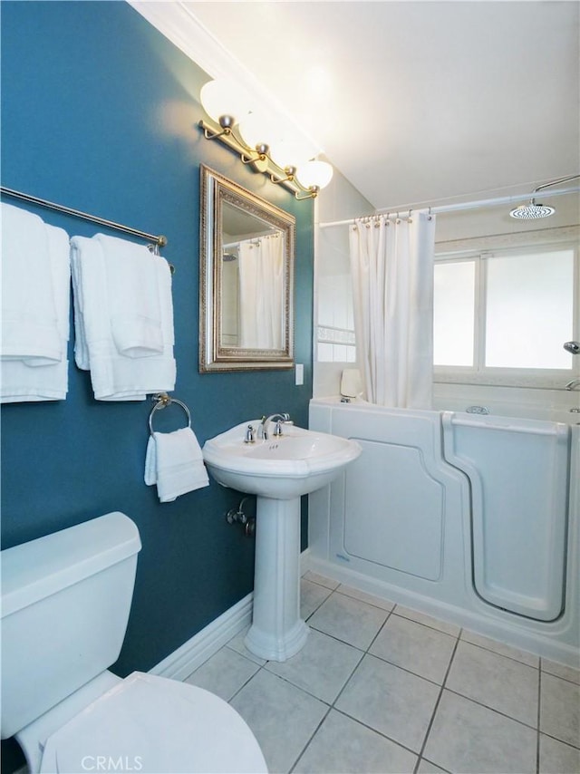 1163 Sandwood Pl, San Pedro, CA 90731 - full bath featuring toilet, tile patterned floors, lofted ceiling, baseboards, and shower / bath combination with curtain