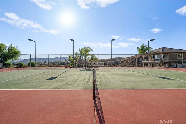 43845 Calle De Velardo, Temecula, CA 92592 - view of tennis court with a mountain view and community basketball court