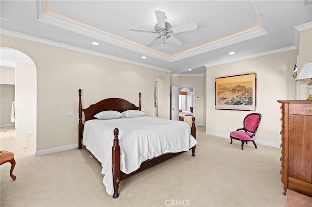 43845 Calle De Velardo, Temecula, CA 92592 - bedroom featuring arched walkways, a raised ceiling, crown molding, light colored carpet, and recessed lighting