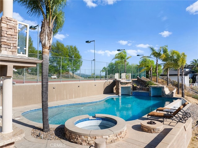 43845 Calle De Velardo, Temecula, CA 92592 - view of swimming pool with a fire pit, a patio, and a pool with connected hot tub