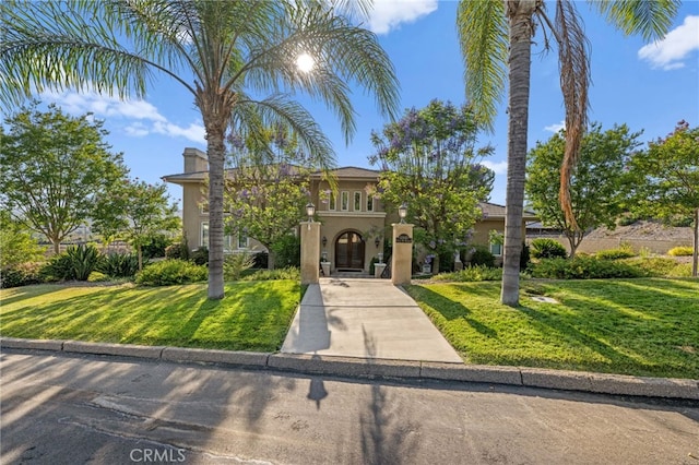 43845 Calle De Velardo, Temecula, CA 92592 - mediterranean / spanish-style home featuring stucco siding and a front lawn