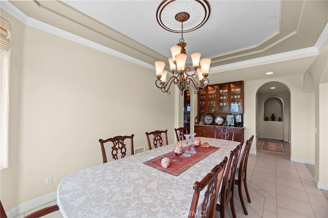43845 Calle De Velardo, Temecula, CA 92592 - dining room featuring arched walkways, a chandelier, ornamental molding, light tile patterned flooring, and a raised ceiling