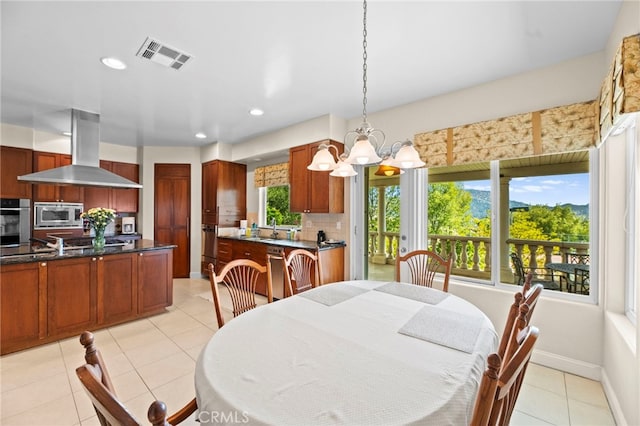43845 Calle De Velardo, Temecula, CA 92592 - dining area featuring a chandelier, light tile patterned floors, and recessed lighting