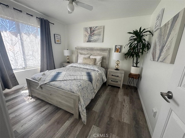 12477 Redrock Ct, Victorville, CA 92392 - bedroom featuring baseboards, wood finished floors, and ceiling fan