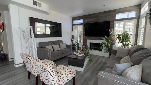 12477 Redrock Ct, Victorville, CA 92392 - living area featuring wood finished floors and a fireplace