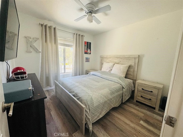 12477 Redrock Ct, Victorville, CA 92392 - bedroom with dark wood finished floors and a ceiling fan