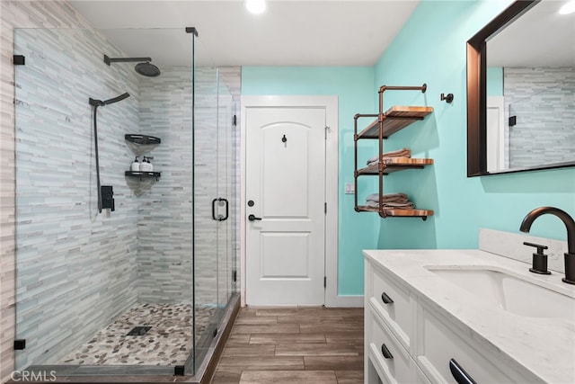 4941 Catamaran St, Oxnard, CA 93035 - full bathroom featuring vanity, a shower stall, and wood finished floors